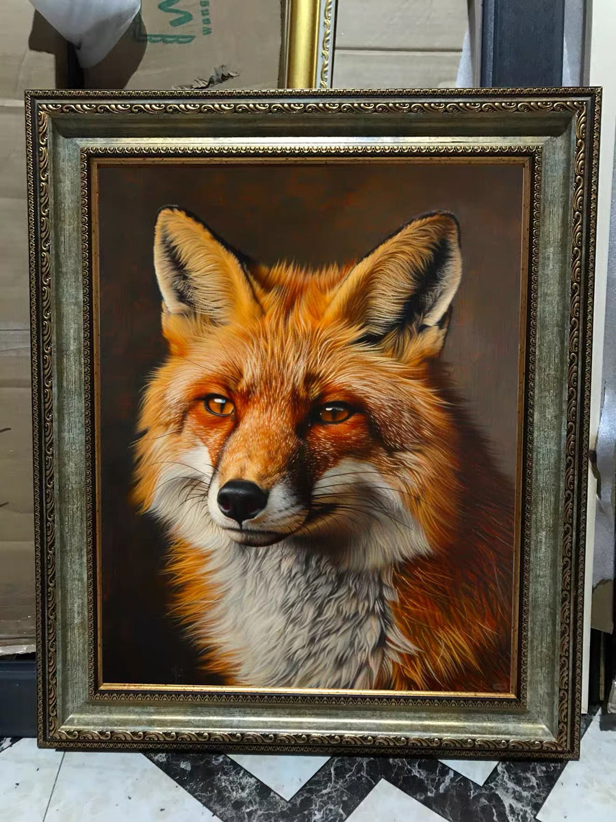 An ornate gold-and-gray-framed realistic portrait of a red fox shown from the chest up against a dark brown background.
