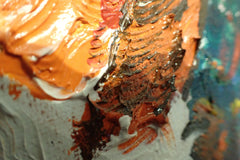 Close-up of orange, brown and white raised impasto brushwork