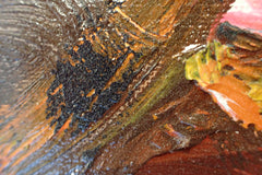 Close-up of brown and orange layered impasto texture